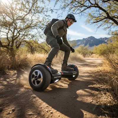 Swagtron T6 Outlaw Hoverboard navigating an off-road dirt path with ease